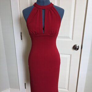 Red dress, sheath bodycon, bow on the back and slit